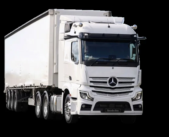 White Mercedes-Benz Actros long-distance truck with a box body
